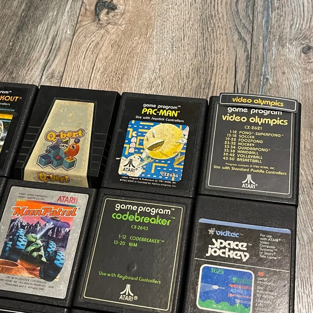 Atari 2600 Vintage Game Lot 18 Cartridges PacMan Space Invaders Spider-Man Qbert